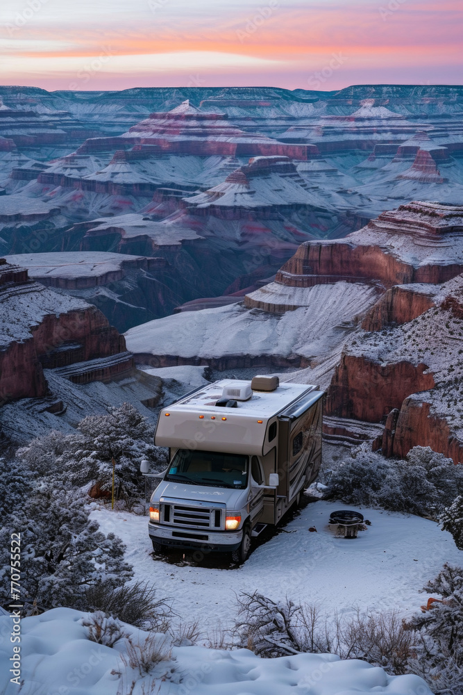 RV truck in snow field in winter in rugged land.