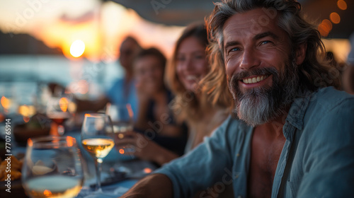 A group of avid sailors gathers at the yacht club s waterfront bar and grill to swap stories of their latest adventures at sea  their laughter mingling with the sound of clinking g