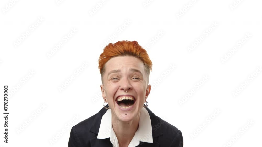 A joyous woman with red hair cannot contain her laughter, showcasing genuine mirth with her hands on her cheeks. Her fashionable dark suit contrasts the white background. Camera 8K RAW. A joyous woman with red hair cannot contain her laughter, showcasing genuine mirth with her hands on her cheeks. Her fashionable dark suit contrasts the white background. Camera 8K RAW.