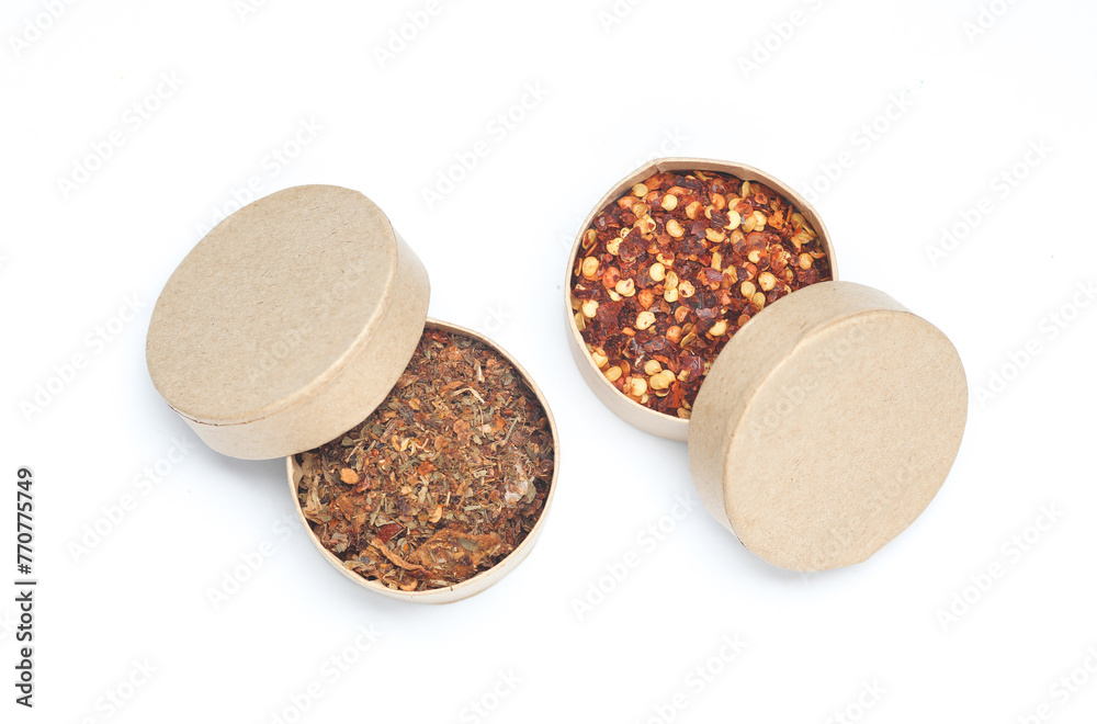 Spices in cardboard boxes on a white background Spices in cardboard boxes on a white background