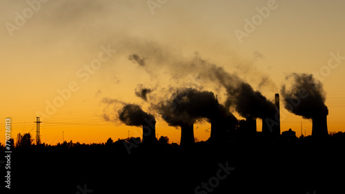 Coal power plant silhouette at sunrise, South Africa