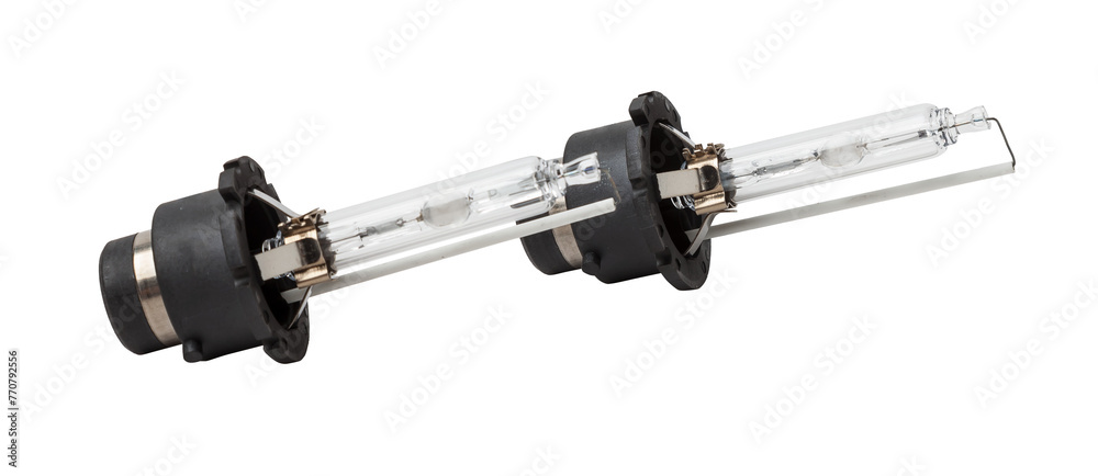 Xenon is a new lamp for automotive headlights on a white background. Gas-discharge lighting devices Xenon is a new lamp for automotive headlights. Used auto parts catalog from junkyard. Xenon is a new lamp for automotive headlights on a white background. Gas-discharge lighting devices Xenon is a new lamp for automotive headlights. Used auto parts catalog from junkyard.