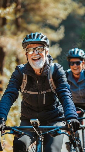 Active Senior Couple Biking Autumn Day