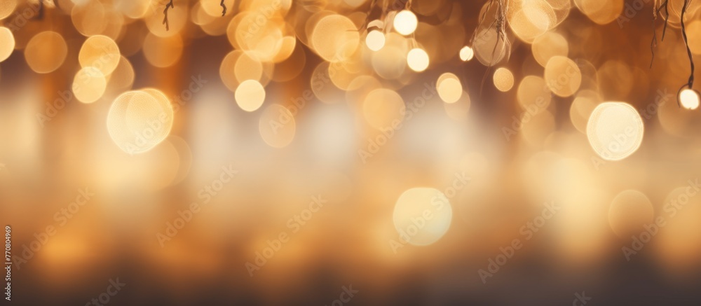 A blurry image of Christmas lights against a dark background resembling tints and shades of Brown, Amber, Orange, and Wood. The lights form a pattern like a tree in the sky with clouds A blurry image of Christmas lights against a dark background resembling tints and shades of Brown, Amber, Orange, and Wood. The lights form a pattern like a tree in the sky with clouds