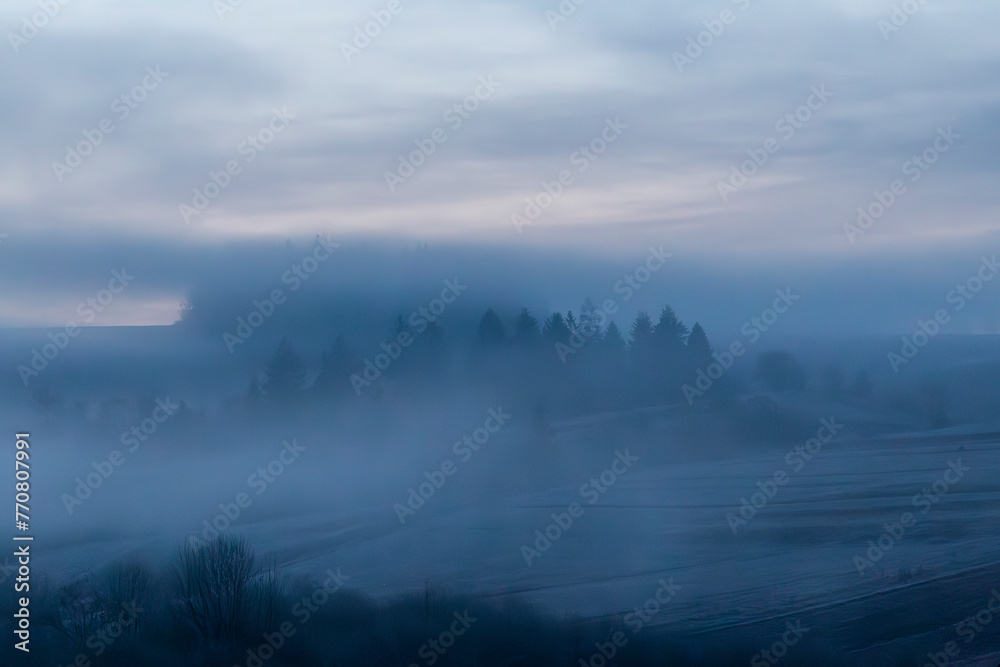Fototapeta premium Early morning winter landscape at the foot of the Tatra mountains in Slovakia