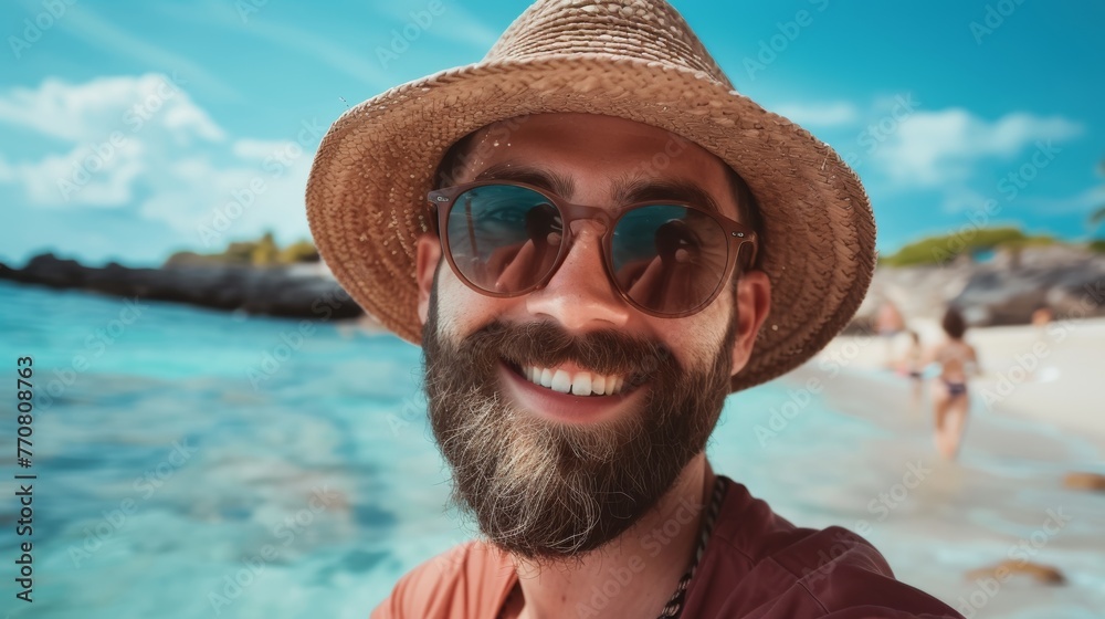 close-up shot of a good-looking male tourist. Enjoy free time outdoors near the sea on the beach. Looking at the camera while relaxing on a clear day Poses for travel selfies smiling happy tropical