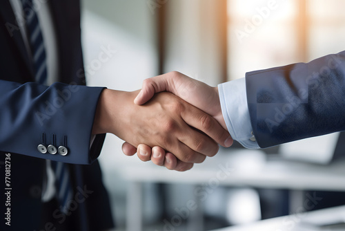 Business Professionals Shaking Hands and Smiling in an Office, Highlighting the Role of Communication Skills for Workplace Success