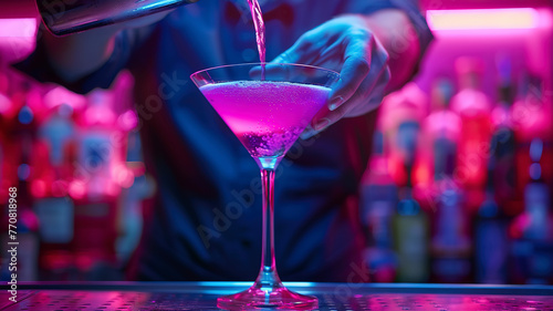 close up of a barman doing cocktail in the bar, barman in the pub, close up o a cocktail on the table