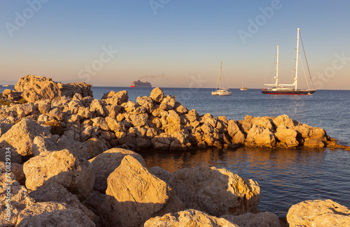 Ships in the port of Rhodes on a sunny day.