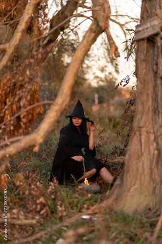 A witch dressed in black dress