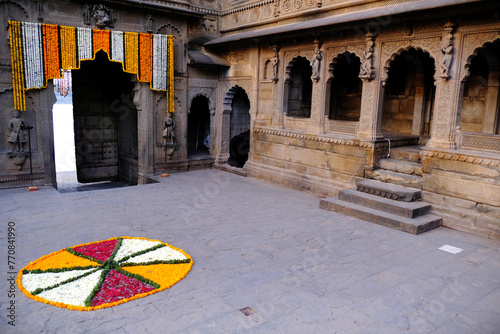 24 Feb 2024, Exterior View of the scenic tourist place Maheshwar fort or Ahilya fort in Madhaya pradesh in India. this monument on the banks of the narmada, Beautiful sculpture or carvings on the wall photo