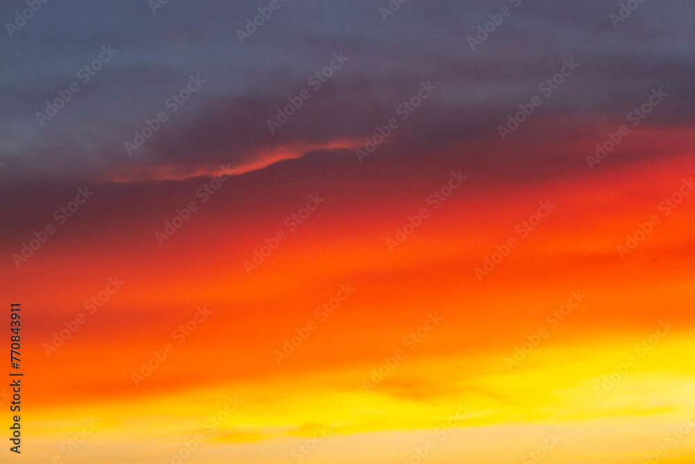 Fiery Orange Clouds At Sunset.