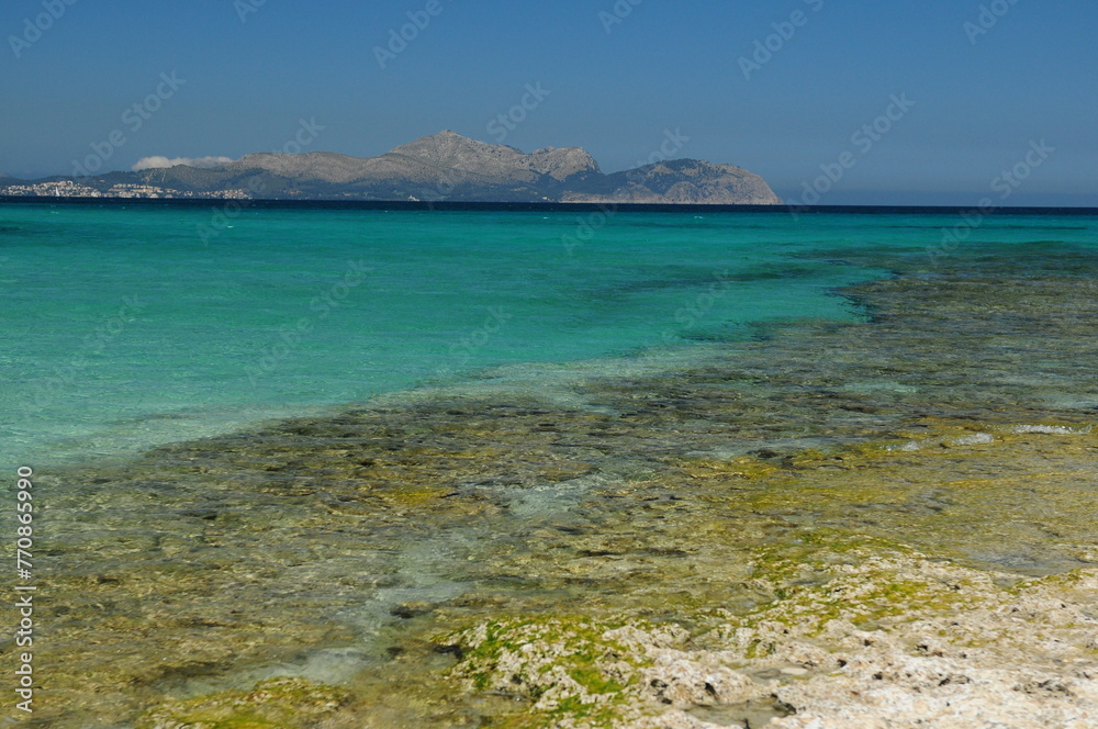 Beautiful Seascape With Turquoise Water At The Beach Of San Baulo Mallorca On A Wonderful Sunny Spring Day With A Clear Blue Sky
