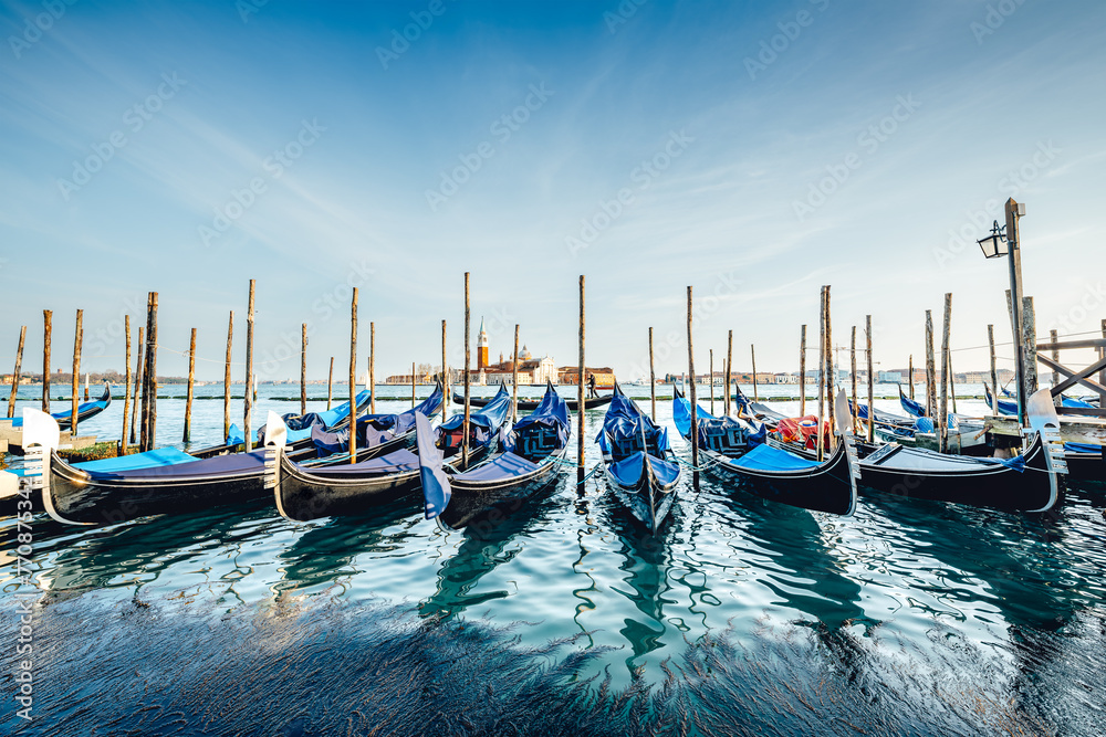 gondolas at the san marco square of venice, italy