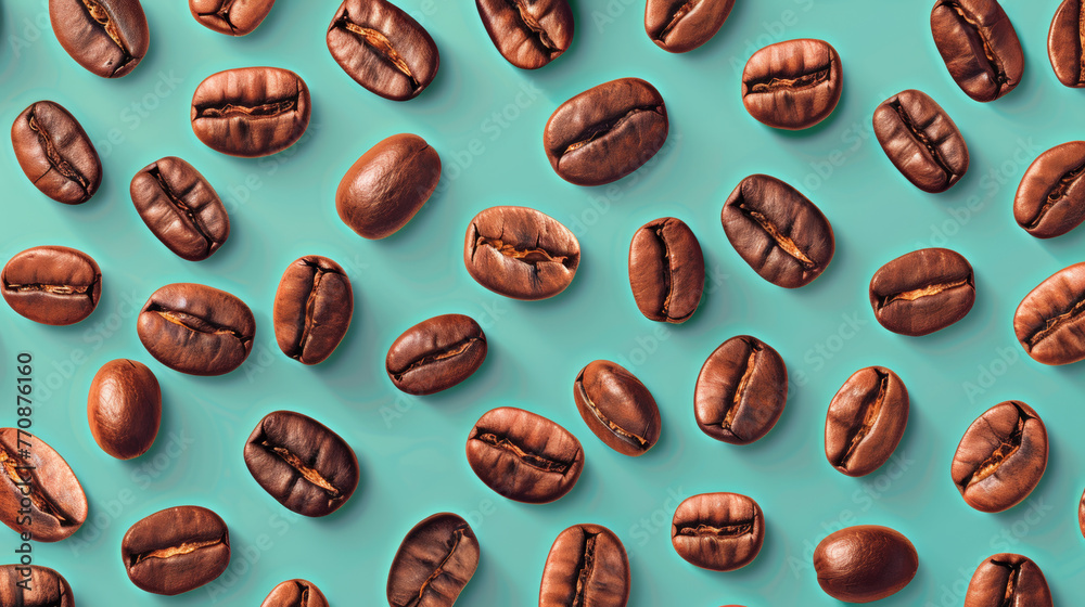 Aromatic roasted coffee beans on pastel mint background. Aromatic roasted coffee beans on pastel mint background.