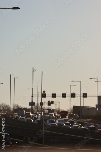 Photography A quick shot of car traffic with queues and an airplane on approach to Stockholm