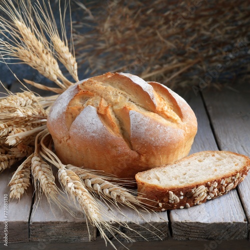 freshly baked aromatic bread with ears of wheat
