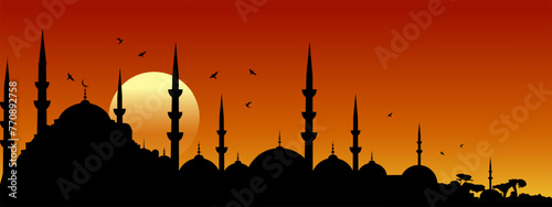Silhouette of a mosque against a colorful red-yellow sunset sky. Arabian night background. Rabadan, mosque, sunrise, sunset. Vector illustration EPS 10