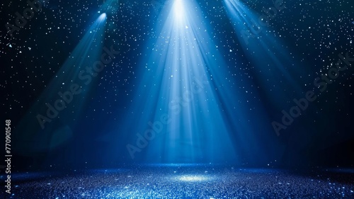 Majestic blue stage lights with glimmering particles - A captivating image showcasing brilliant blue stage lights casting down on a glittery surface, giving a sense of awe and wonder