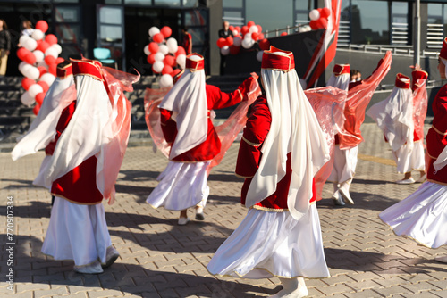  Bursa Turket - October 29 2022 : National Sovereignty and Children Day festival.Turkish children dancing in red and white traditional costumes
