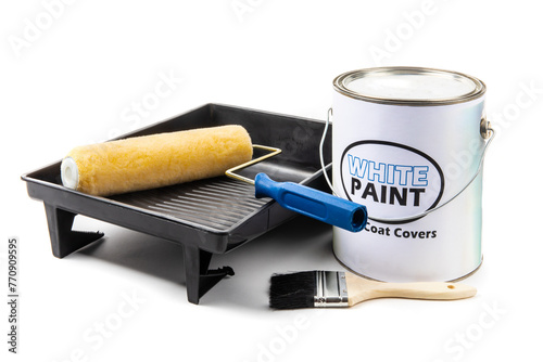 a gallon can of paint with a fake, generic, white paint label, with a yellow roller and brush and a black plastic paint tray isolated on white
