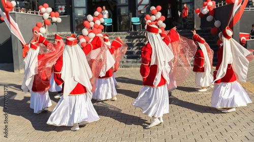  Bursa Turket - October 29 2022 : National Sovereignty and Children Day festival.Turkish children dancing in red and white traditional costumes