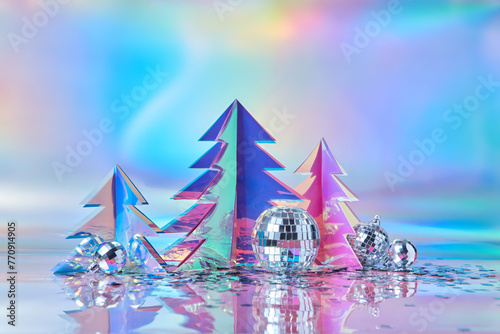 Christmas trees of holographic plastic decorated with disco balls photo