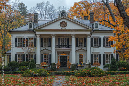 A classic colonialstyle house with symmetrical front facade, large central columns and gegasations, adorned by intricate shutters, surrounded by lush gardens. Created with Ai photo