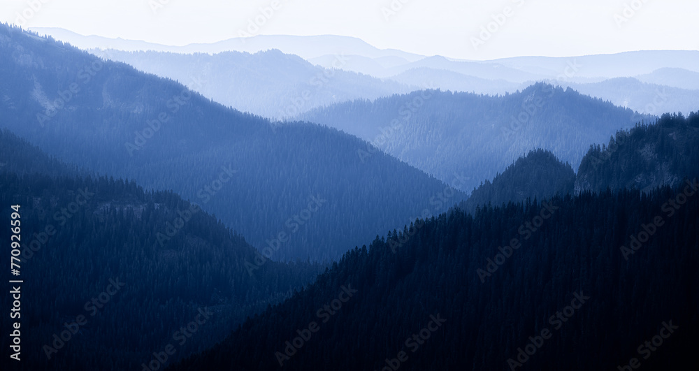 Fototapeta premium layers through the cascade mountains.