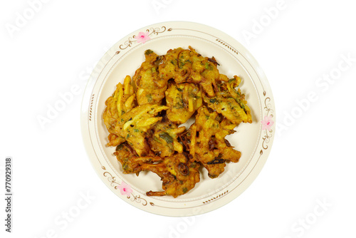 Plate of pakoras on isolated white background, Indian, Pakistani Food © Muzzammil