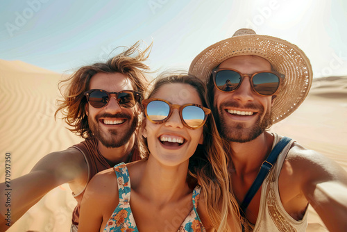 group of adventurous Friends with sunglasses Taking a Selfie in the Desert during summer vacation © Renata Hamuda