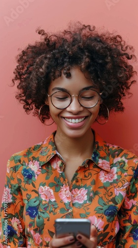 Woman in Glasses Looking at Cell Phone