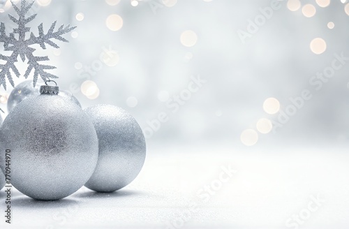 Elegant silver Christmas baubles with a sparkling snowflake, against a soft bokeh light background. Generative AI