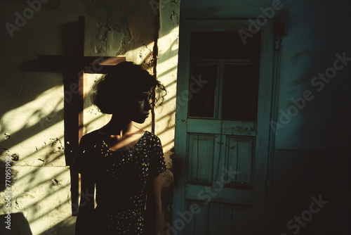Silhouette of woman with shadow play in a rustic room