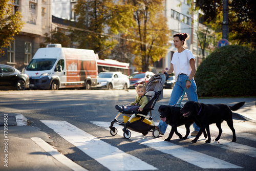 Portrait of a family crossing the street photo