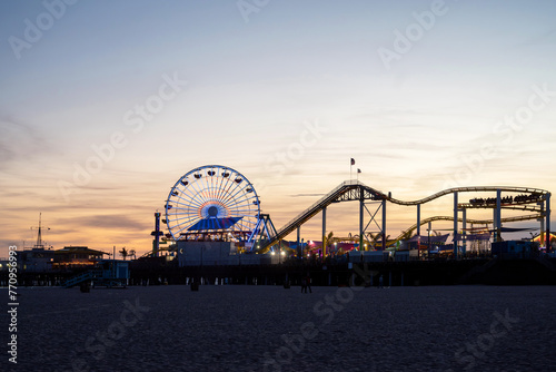 Santa Monica pier At Dusk with amusement Park photo