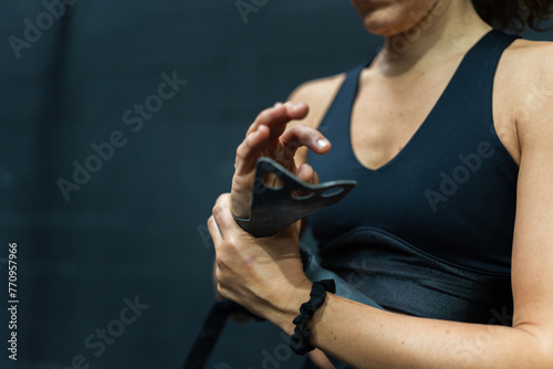 Close-up of a woman getting ready to train at the gym photo