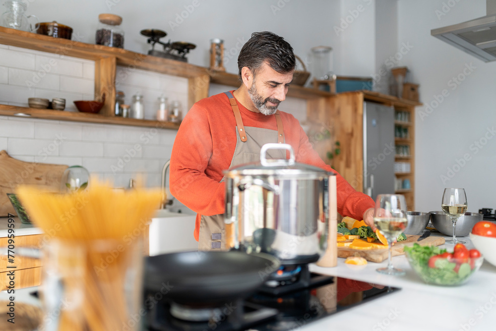 Focused Home Chef Preparing meal at home Focused Home Chef Preparing meal at home