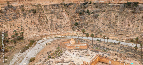 The balconies of Ghoufi, an ancient Berber village, with houses made of stone and clay, carved into waterfalls in the rock, this large canyon is crossed by the Abiod river. Batna. Algerla photo