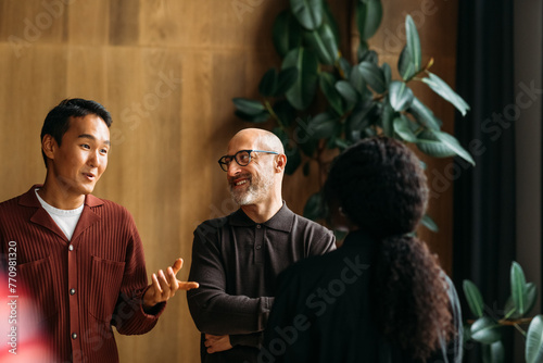 Colleagues standing in cafe