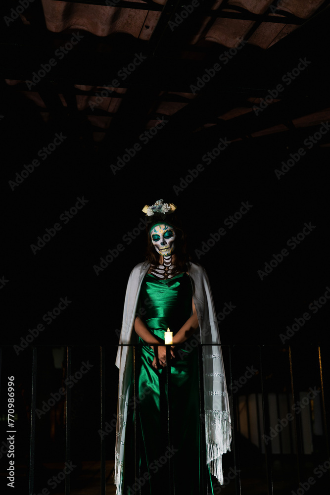 Portrait of a woman with catrina makeup. Portrait of a woman with catrina makeup.