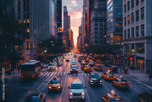 A busy city street with a sunset in the background photo