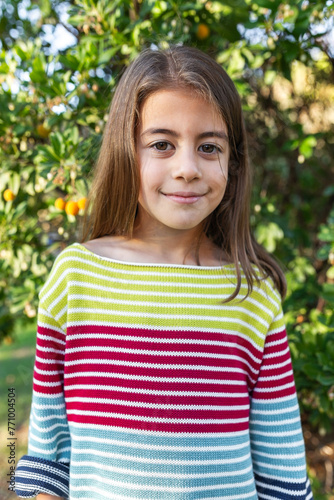 portrait of little girl outdoors photo