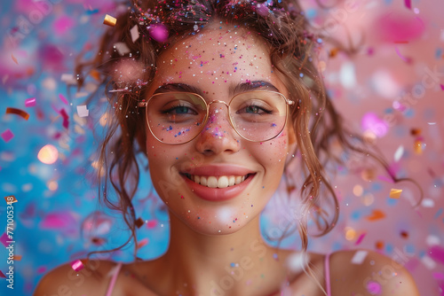 Woman with glasses and confetti, happiness, celebration, party, social event