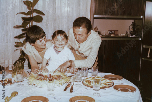 1979. A family celebrating a birthday photo