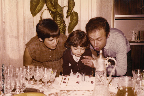 1981: Family celebrating a birthday. photo