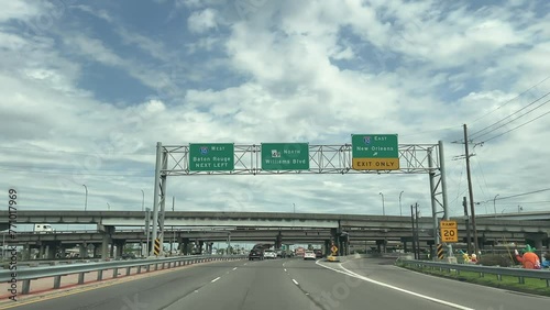 Signs on the interstate for Baton Rouge and New Orleans