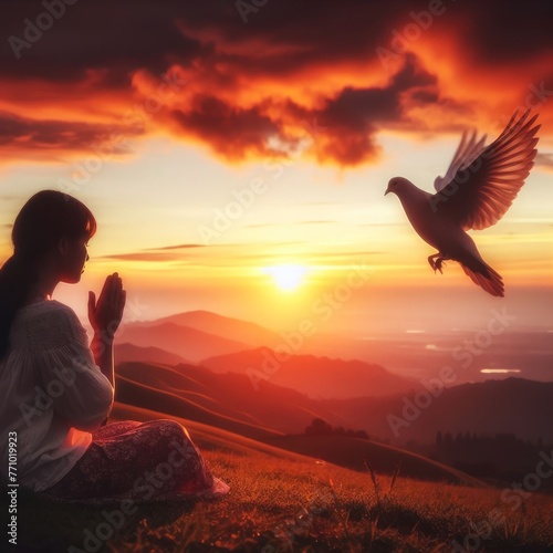 Woman praying and free bird enjoying nature on sunset background  hope concept 