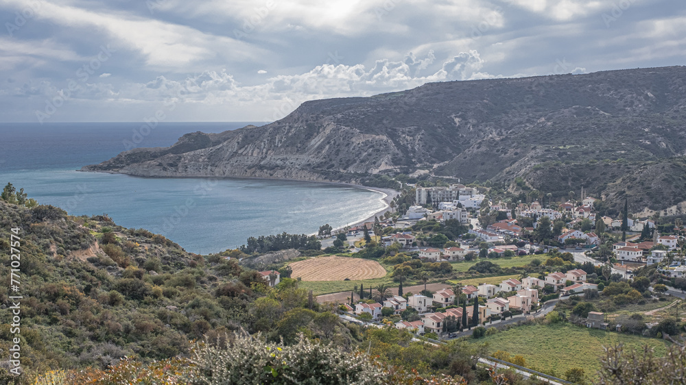 View of the stunning Pissouri Bay, the popular tourist resort of the village of Pissouri, as seen from the Eastern hilltop above the bay, located 30 km west of Limassol, Cyprus