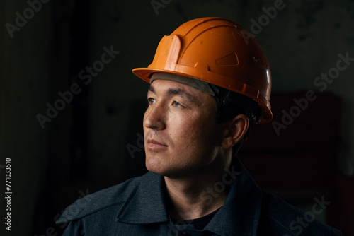 Portrait of a man wearing a work helmet